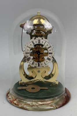 Lot 619 - A THWAITES AND REED SKELETON CLOCK UNDER DOME WITH ONYX BASE