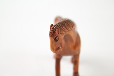Lot 1198 - AN ANTIQUE NETSUKE HORSE HAND CARVED SIGNED WOODEN GLASS EYES