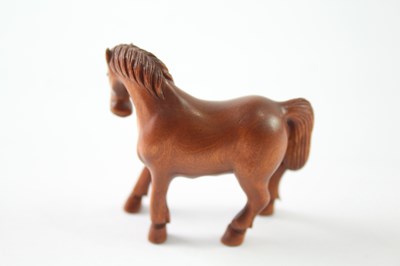 Lot 1198 - AN ANTIQUE NETSUKE HORSE HAND CARVED SIGNED WOODEN GLASS EYES