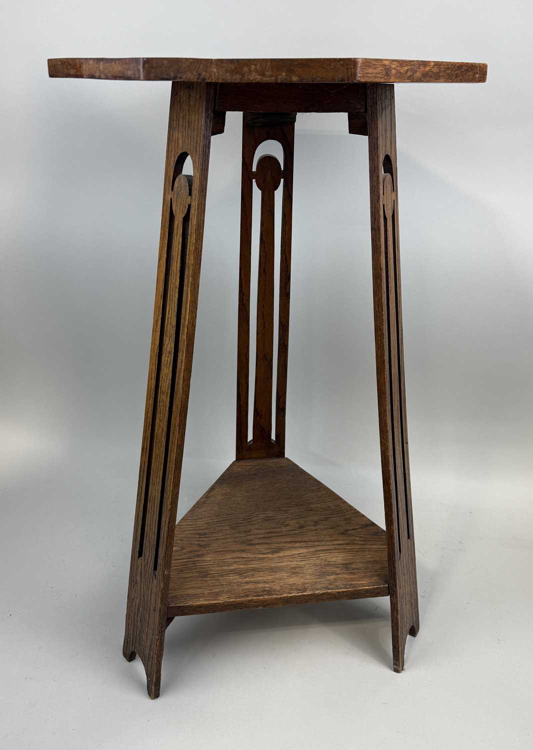 Lot 842 - MANNER OF LIBERTY AND CO: AN ARTS AND CRAFTS OAK OCTAGONAL TABLE