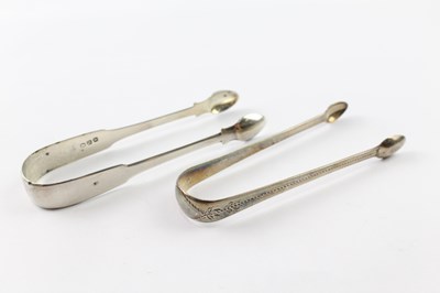 Lot 328 - TWO .925 STERLING SILVER GEORGIAN SUGAR TONGS (2)