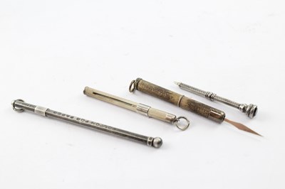 Lot 421 - FOUR .925 STERLING SILVER TOOTHPICKS AND SWIZZLE STICK (4)