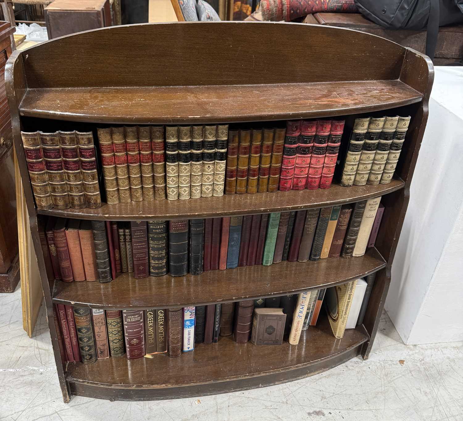 Lot 881 - A BOOKCASE WITH FAUX BOOKS AND REAL BOOKS