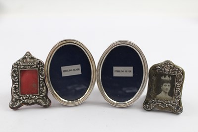 Lot 372 - A SET OF FOUR .925 STERLING SILVER SMALL/MINIATURE PHOTOGRAPH FRAMES (4)