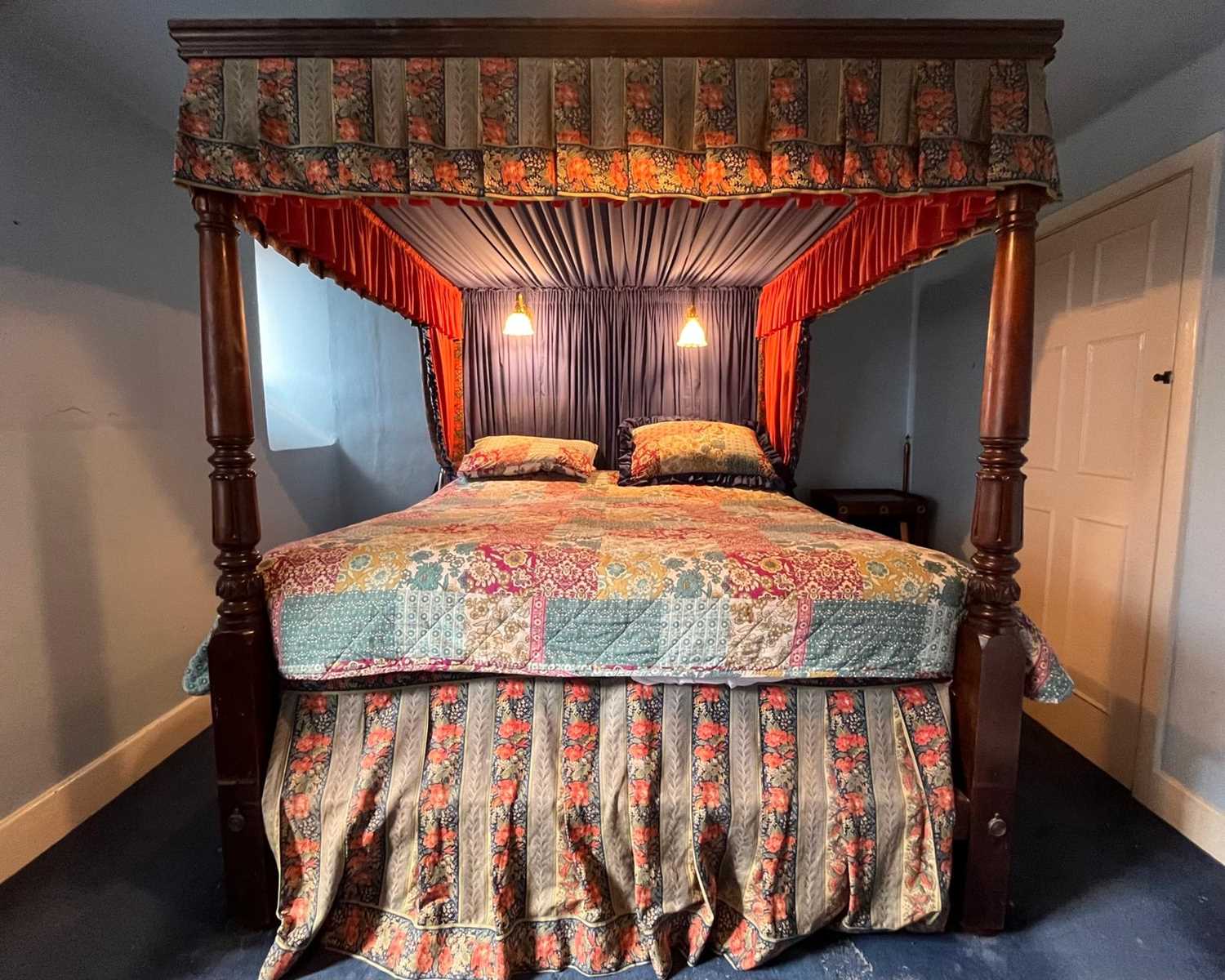 Lot 865 - AN ANTIQUE AND LATER FOUR POSTER BED WITH LIBERTY AND CO FABRIC