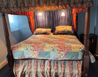Lot 865 - AN ANTIQUE AND LATER FOUR POSTER BED WITH LIBERTY AND CO FABRIC