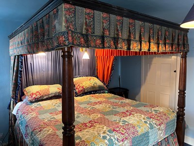 Lot 865 - AN ANTIQUE AND LATER FOUR POSTER BED WITH LIBERTY AND CO FABRIC