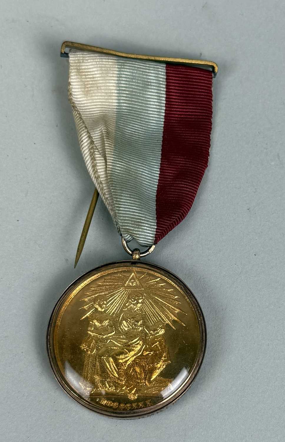 Lot 297 - A 9CT GOLD MOUNTED MASONIC MEDAL AWARDED TO
