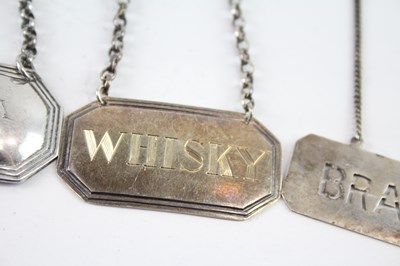 Lot 401 - FOUR .925 STERLING SILVER DECANTER LABELS