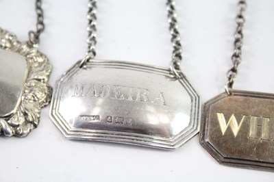 Lot 401 - FOUR .925 STERLING SILVER DECANTER LABELS