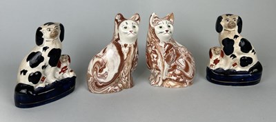 Lot 656 - A PAIR OF STAFFORDSHIRE CERAMIC CATS AND A PAIR OF DOGS (4)