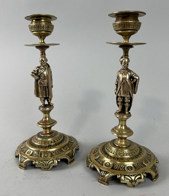 Lot 635 - A PAIR OF 19TH CENTURY CHINOISERIE FIGURAL BRASS CANDLESTICKS