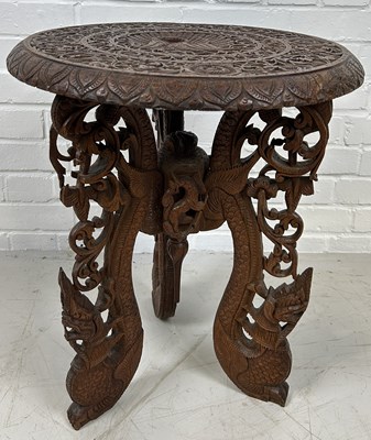 Lot 662 - A PROFUSELY CARVED INDIAN OCCASIONAL TABLE