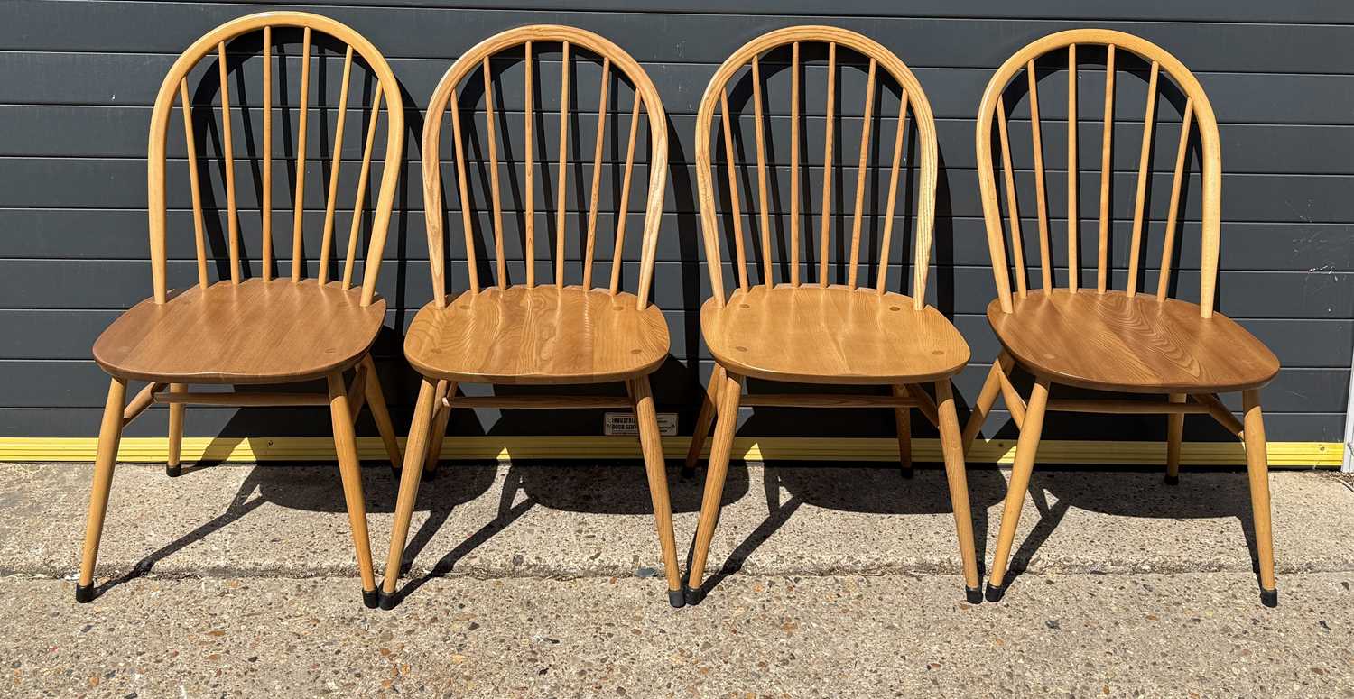 Lot 779 - A SET OF FOUR ERCOL DINING CHAIRS