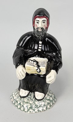 Lot 466 - STAFFORDSHIRE, A RELIGIOUS FIGURE IN A CLOAK