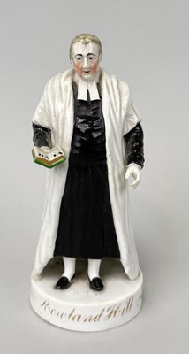 Lot 470 - STAFFORDSHIRE, ROWLAND HILL, HOLDING A BOOK IN HIS HAND
