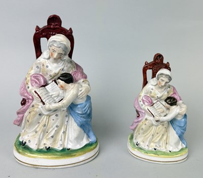 Lot 471 - STAFFORDSHIRE, A PAIR, MARY TAUGHT BY ST ANNE, CIRCA 1850'S