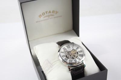 Lot 426 - A MEN'S ROTARY SKELETON DRESS WATCH