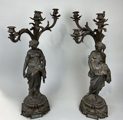 Lot 1215 - A PAIR OF FRENCH HEAVY CAST METAL FIGURAL CANDElABRA (2)