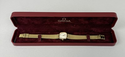 Lot 395 - A LADIES VINTAGE OMEGA DE VILLE 10CT GOLD PLATED WATCH