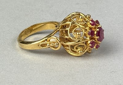 Lot 382 - A 22CT GOLD RUBY CLUSTER RING