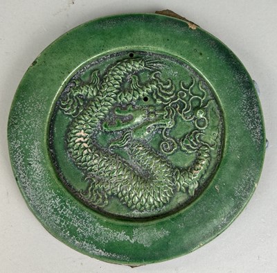 Lot 581 - AN ANTIQUE CHINESE GREEN GLAZED DRAGON TILE