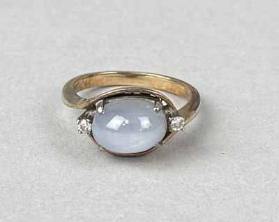 Lot 417 - A 9CT GOLD STAR SAPPHIRE AND DIAMOND RING