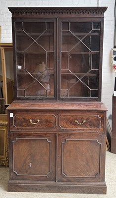 Lot 1027 - A GEORGIAN MAHOGANY BUREAU BOOKCASE