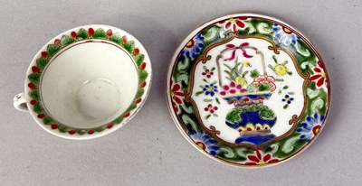 Lot 248 - A CHINESE FAMILLE VERTE CUP AND SAUCER