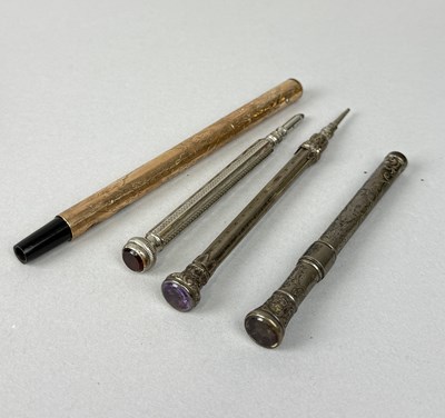 Lot 296 - A 9CT GOLD CASED PEN CASE ALONG WITH THREE SILVER PROPELLING PENCILS