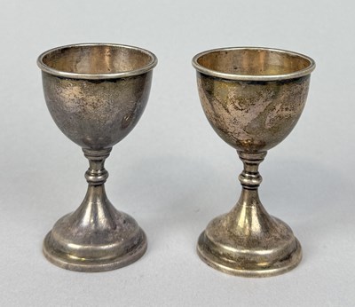 Lot 301 - A PAIR OF SILVER EGG CUPS