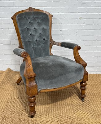 Lot 1066 - A 19TH CENTURY CARVED ARMCHAIR WITH BLUE BUTTON BACK UPHOLSTERY