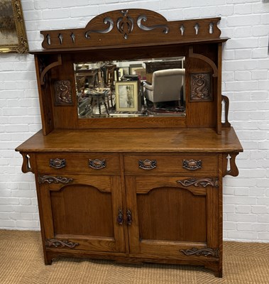 Lot 1012 - IN THE MANNER OF LIBERTY AND CO: A DRESSER WITH MIRROR BACK AND COPPER DOLPHIN INSERT PANELS