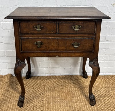Lot 1074 - A GEORGIAN STYLE LOW BOY WITH HOOF FEET