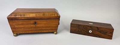 Lot 579 - A REGENCY MAHOGANY TEA CADDY WITH PARQUETRY INLAY, BRASS LION HEAD HANDLES