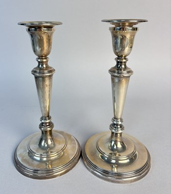 Lot 251B - A PAIR WILLIAM COMYNS & SONS SILVER CANDLESTICKS WITH SCONCES, 1967
