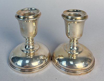 Lot 269 - A PAIR OF CS GREEN & CO WEIGHTED .925 STERLING SILVER DWARF CANDLESTICKS