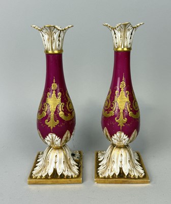 Lot 664 - A PAIR OF EUROPEAN PORCELAIN CANDLESTICKS