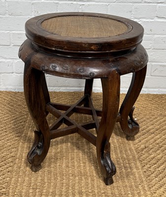 Lot 1077 - A CHINESE HARDWOOD STOOL WITH CANE SEAT