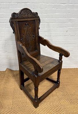 Lot 1053 - A 17TH CENTURY STYLE OAK WAINSCOT CHAIR