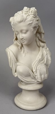 Lot 643 - A WHITE CERAMIC BUST OF A LADY
