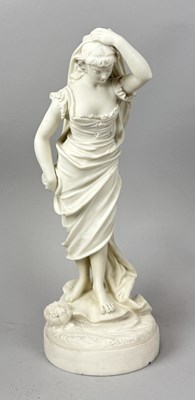 Lot 630 - A WHITE CERAMIC FIGURE OF A LADY STANDING