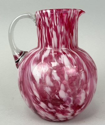 Lot 647 - A PINK GLASS JUG