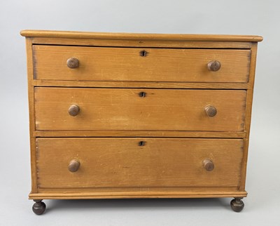 Lot 648 - A TABLE-TOP THREE DRAWER CABINET
