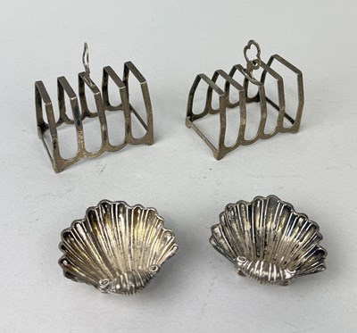 Lot 308 - A PAIR OF SILVER TOAST RACKS ALONG WITH A PAIR OF SCALLOP SHELL SALTS