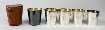 Lot 304 - A SET OF FIVE ASPREY AND CO SILVER PLATED SHOT CUPS