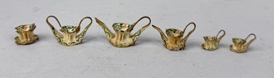 Lot 551 - A RARE PRISONER OF WAR PAINTED FISH BONE VERTEBRAE MINIATURE TEA SET