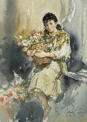 Lot 898 - GORDON KING (BRITISH 1939-2022): A WATERCOLOUR PAINTING ON PAPER DEPICTING A SEATED LADY HOLDING A BASKET OF FLOWERS