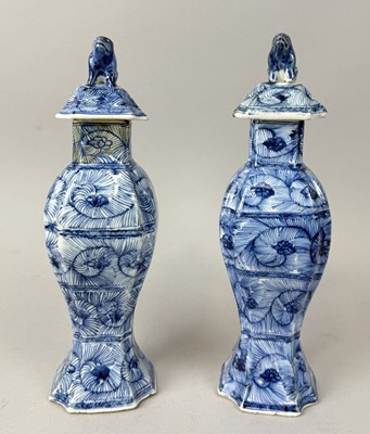 Lot 184 - A PAIR OF CHINESE KANGXI VASES WITH COVERS