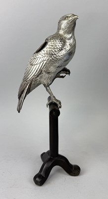 Lot 181 - A JAPANESE MEIJI PERIOD SILVERED HAWK OKIMONO ON BRONZE STAND